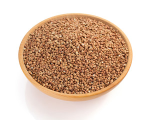 buckwheat in bowl isolated on white