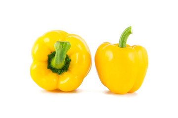 Ripe yellow bell peppers. Isolated on white background