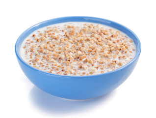 buckwheat in bowl isolated on white