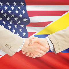 Businessmen handshake - United States and Colombia