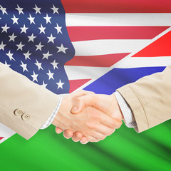 Businessmen handshake - United States and Gambia