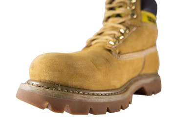 Large yellow shoes with rough soles and laces