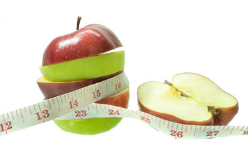 apple with measuring tape on white background 1