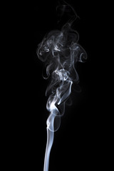 gray smoke on a black background.
