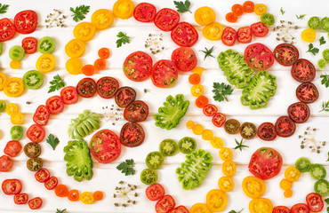 Beautiful ripe tomatoes on wood surface