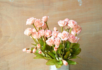 pink rose on wood background vintage style