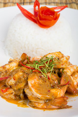 Curry fried shrimps and cooked rice