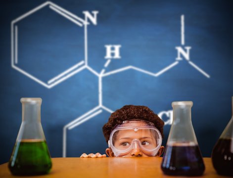 Composite image of cute pupil dressed up as scientist