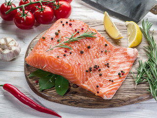 Fresh salmon on the cutting board.