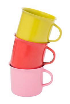 Three color of stacked mugs isolated include path