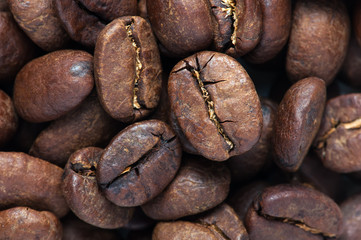 background of big roasted coffee beans