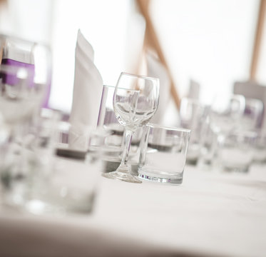 Banquet table. Close-up of empty glasses. Selective focus