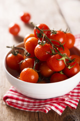 Cherry tomatoes in white bowl