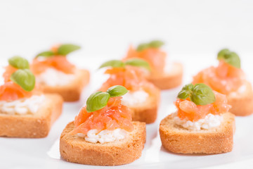 Canapes with smoked salmon and cottage cheese.