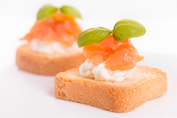 Canapes with smoked salmon and cottage cheese.