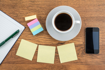 Adhesive Note, notebook and smart phone with coffee