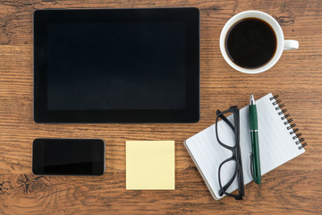 Tablet, Adhesive Note, notebook and smart phone with coffee
