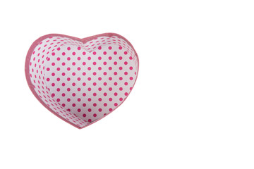 Pink polka dots box in heart shape isolated on white background