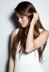 Fototapeta premium portrait of beautiful young asian woman with clear, flawless skin and perfect make-up