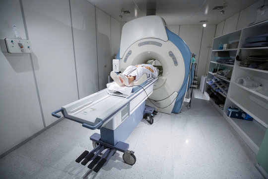 MR scanner in a hospital, with patient being scanned