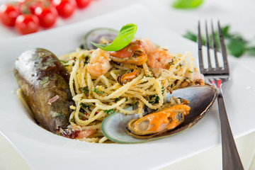 Italian pasta with sea fruit.