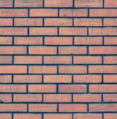 Red brick stone wall seamless background and texture