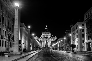Night view at St. Peter's cathedral in Rome, Italy