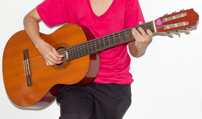 Obraz na płótnie Canvas Playing a guitar