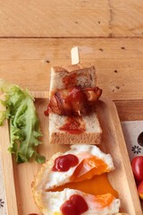 Grilled sausages wrapped in bacon fat of delicious.