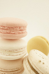 macaroons in vintage color style on mulberry paper texture

