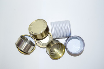 Empty metal cans and different colors.