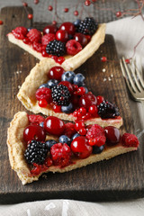 Sweet tart with raspberries, blueberries, blackberries, cherries