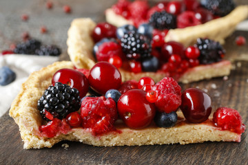 Sweet tart with raspberries, blueberries, blackberries, cherries