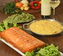 Grilled Salmon on the table with rice and wine