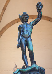 Perseus holding head of Medusa, bronze statue created by Benvenuto Cellini in 1554 and exposed nowadays in Loggia de Lanzi, Piazza della Signoria, Florence