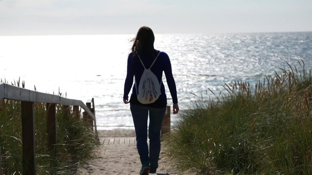 Frau am Strand