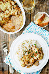chicken baked with mushrooms and cheese with rice