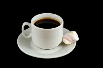 cup of coffee with marshmallows isolated on a black background