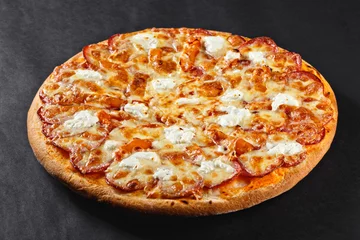 Cercles muraux Pizzeria Hot tasty delicious rustic homemade american pizza with thick crust
