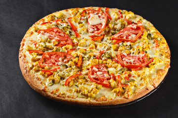 Hot tasty delicious rustic homemade american pizza with thick crust