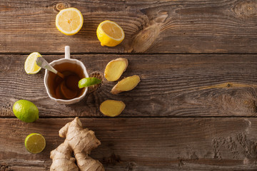 Ginger tea with lime in a white cup