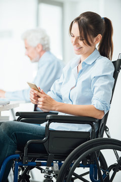 Confident business woman in wheelchair