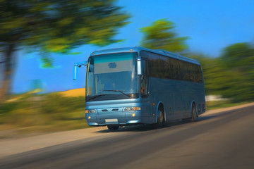 Fototapeta na wymiar tourist bus goes on the highway