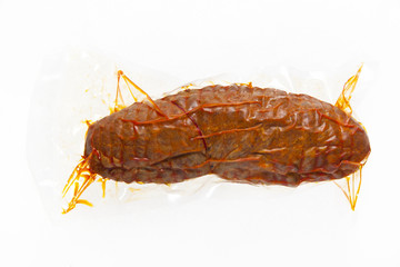 Soppressata . Italian dry salami. overpacked in a plastic bag an