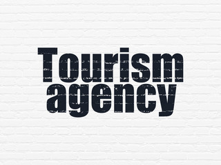 Fototapeta premium Tourism concept: Tourism Agency on wall background
