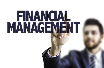Business man pointing the text: Financial Management