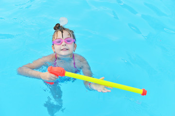 Kids in swimming pool.