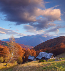 Autumn Landscape with a wooden house