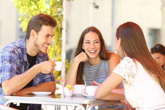 Friends talking in a coffee shop terrace - Powered by Adobe