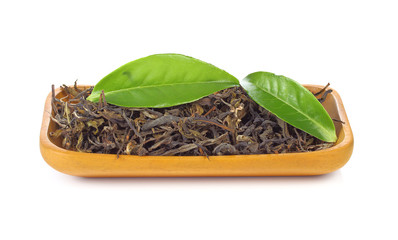 black tea with leaf isolated in wooden on white background